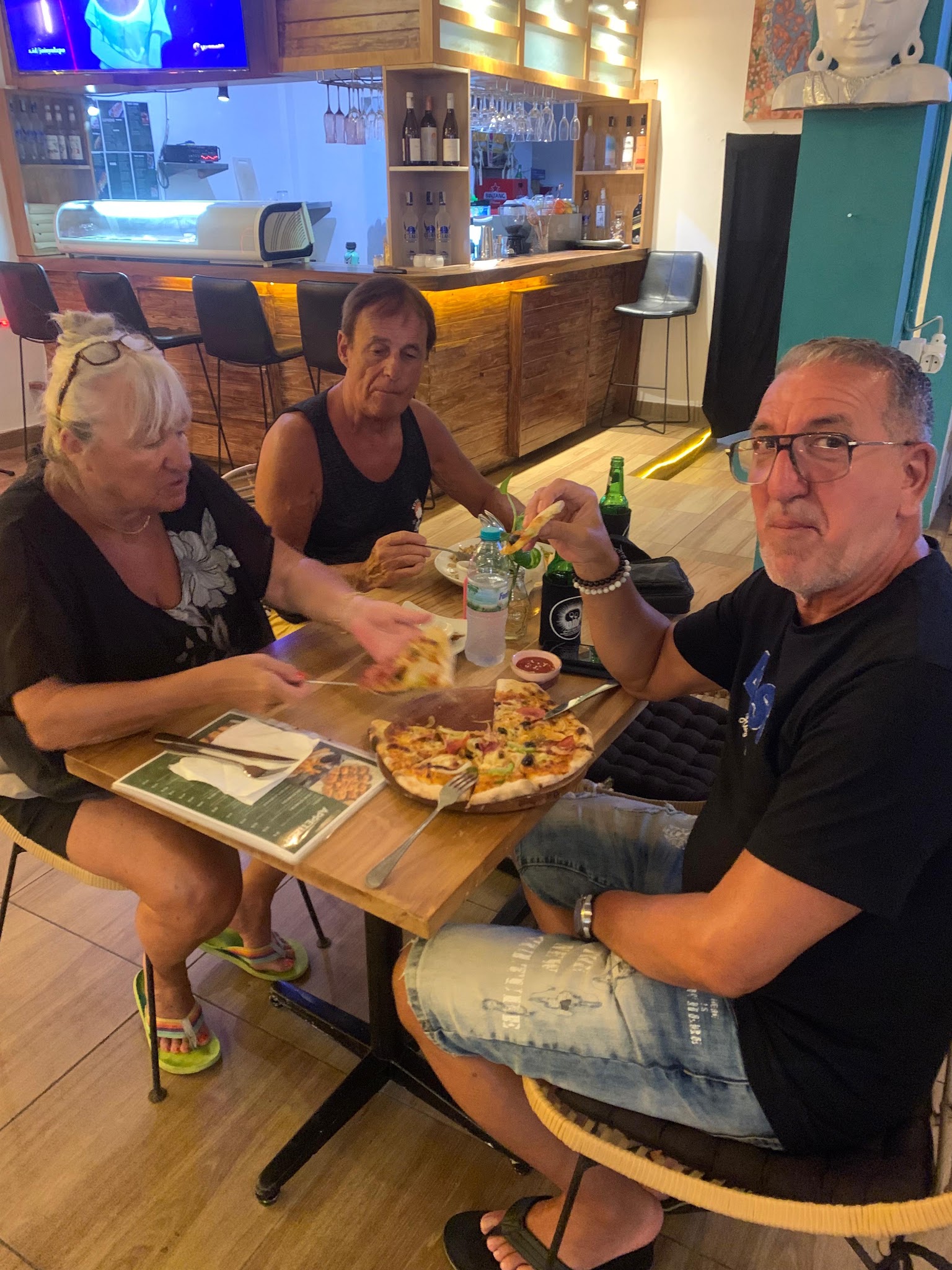 Guests watching sports at UNI Sport Bar Café